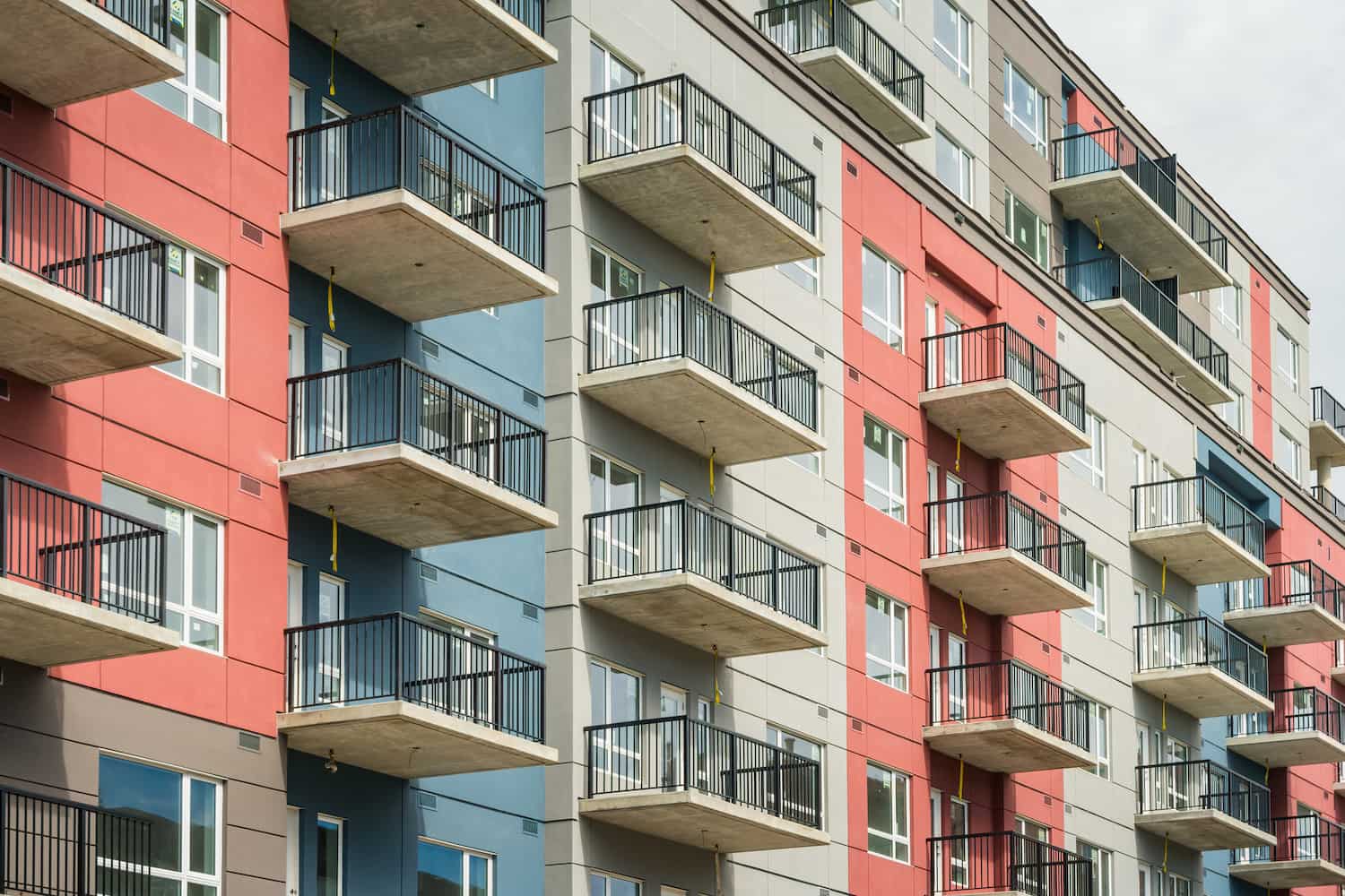 Newly built condos on a sunny day.
