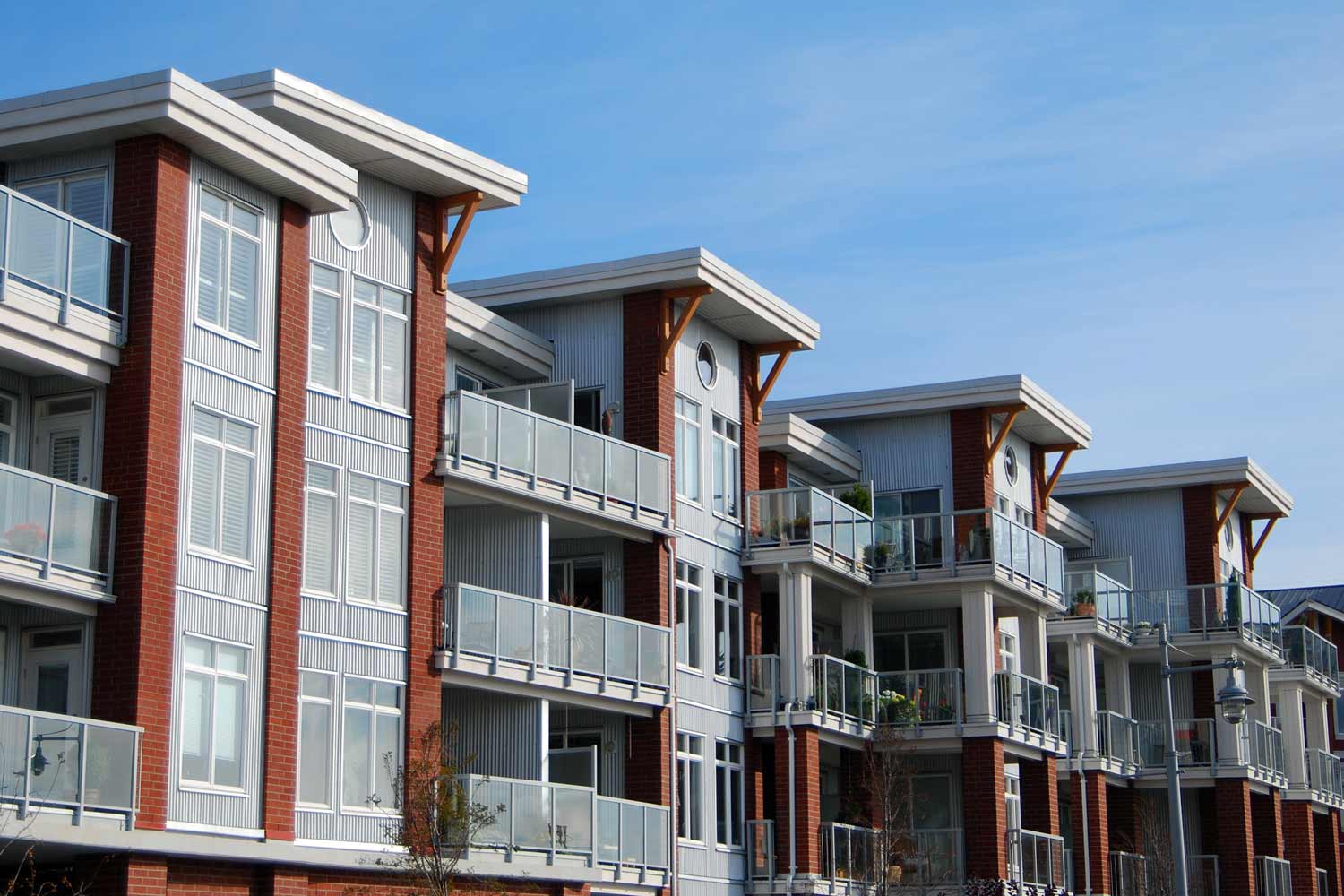 A residential condominium building on a sunny day.