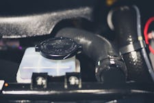Power steering fluid reservoir of the hydraulic steering wheel in the car