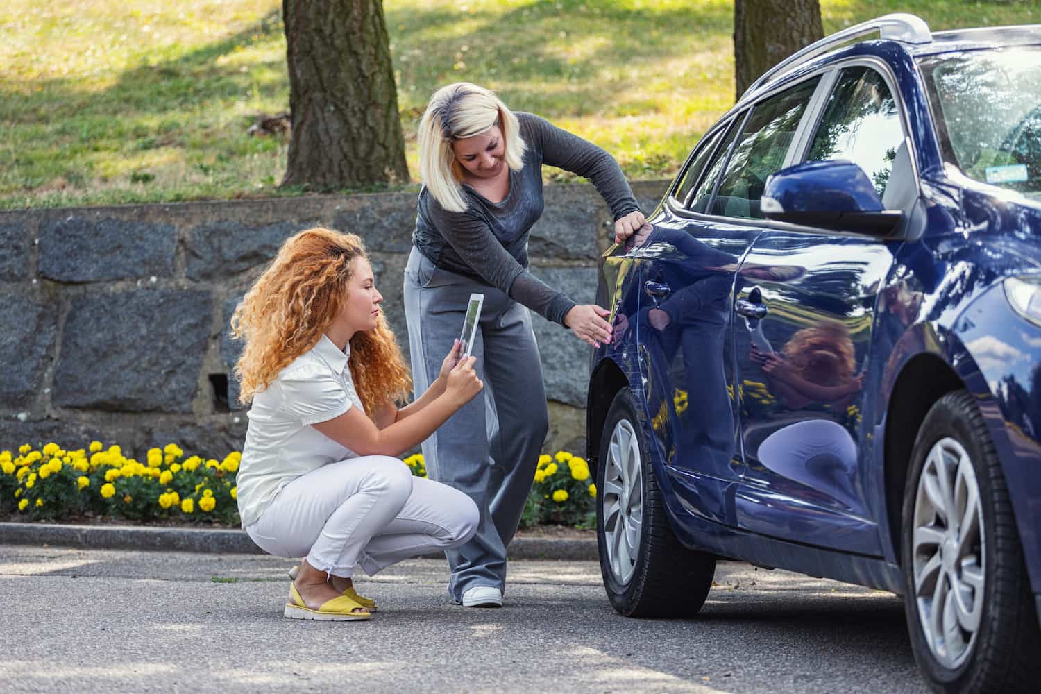 A professional assisting with the claims process following a vehicle incident.