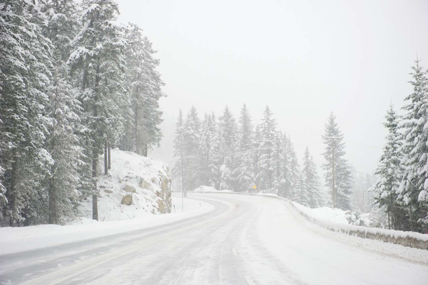 A road during a snowstorm.