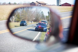 A close up of a car's rear view mirror