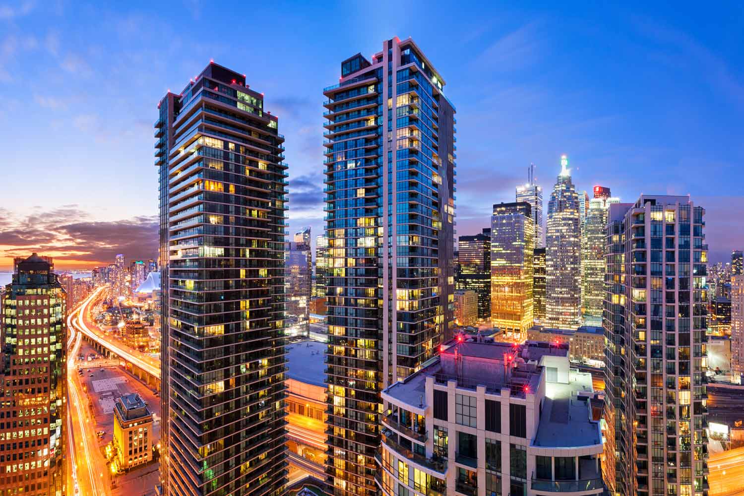 Toronto cityscape and condominium towers at sunset and twilight