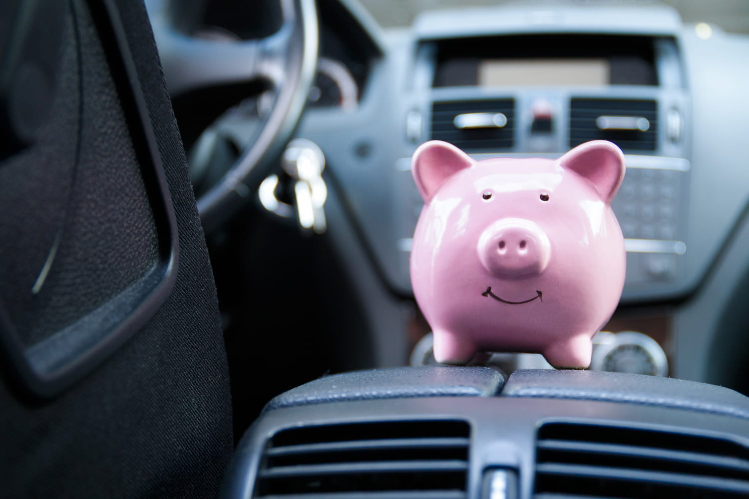 Piggy bank in a car.