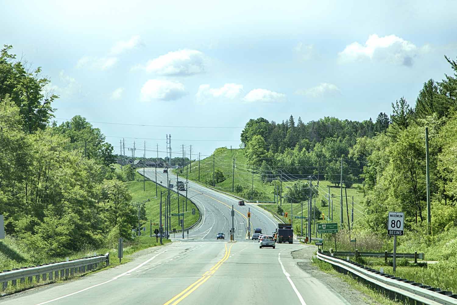 A road leads to the outskirts of a Newmarket city, Ontario, Canada.